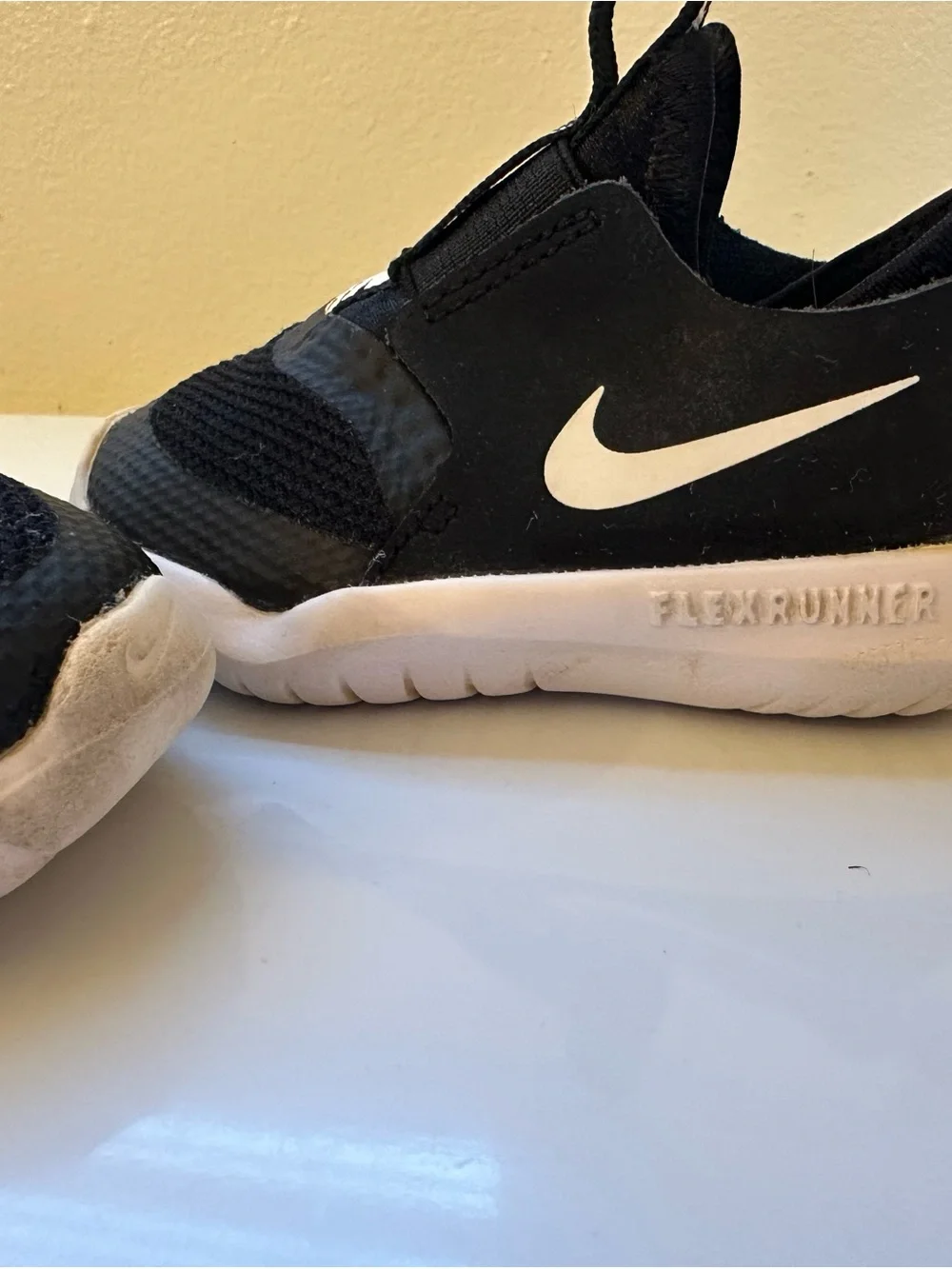 Nike Kids Black & White Slip-On Athletic Sneakers